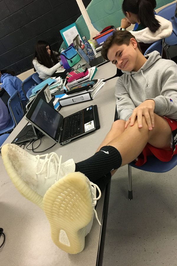 Patrick S. shows off his Addidas Yeezy’s, a favorite sneaker among Longfellow students.