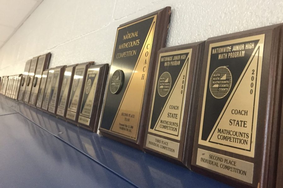 There are many MathCounts trophies and awards hanging along the walls of the math wing.