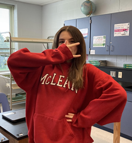 Laila Khonsari sports a McLean sweatshirt.  LIke other 8th graders,Laila is looking forward to having what she hopes will be a normal high school experience. 