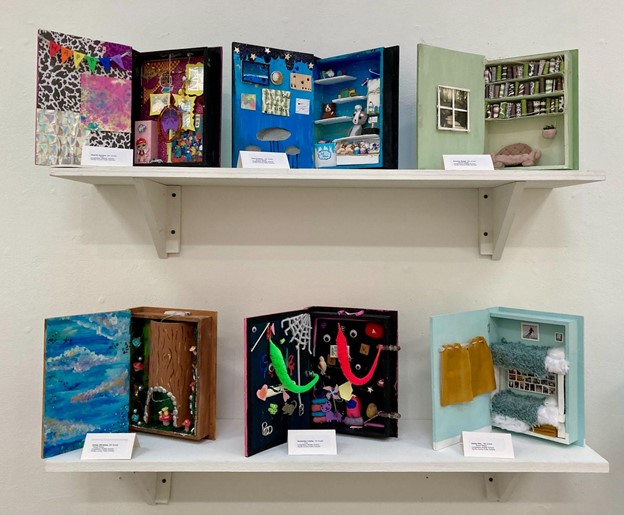 Longfellows Art Extensions students contributed their book box projects to the show. 